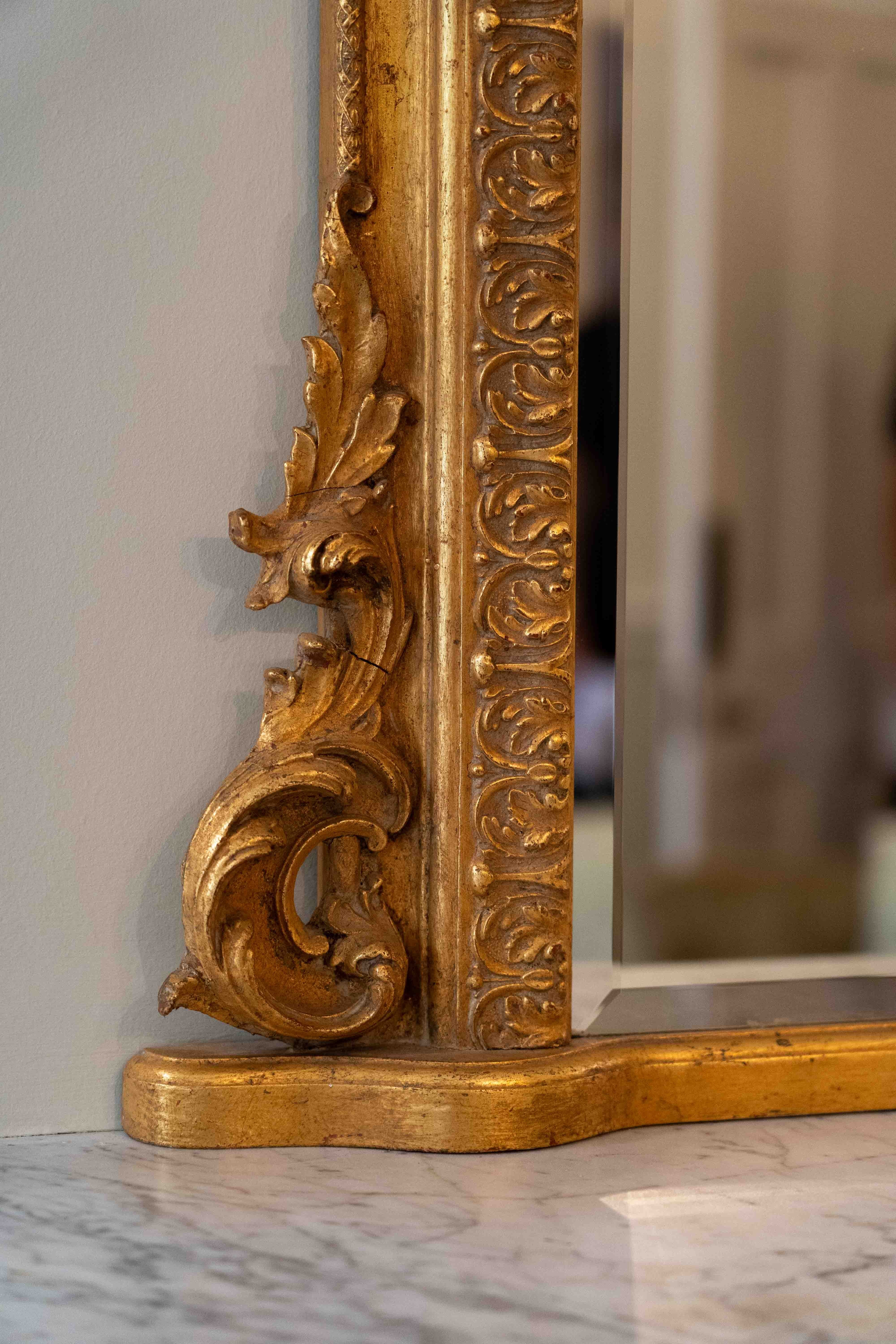 A Victorian style giltwood and composition overmantel mirror, width 138cm, height 180cm. Condition - good